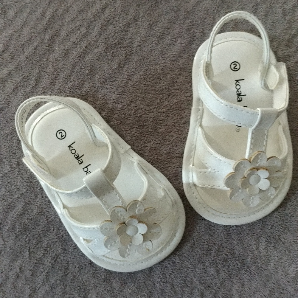 Tiny patent leather sandals